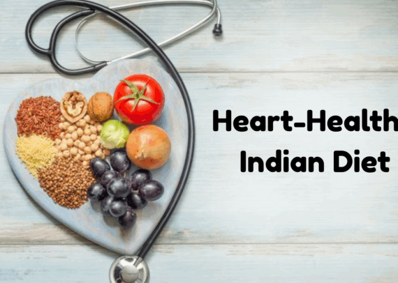 Heart-shaped plate filled with Indian whole grains, legumes, nuts, fruits, and vegetables, placed next to a stethoscope, representing a balanced Indian diet for heart health as recommended by Dr. Akshay Kashid.