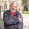 Man experiencing left arm pain and chest discomfort related to possible heart symptoms