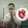 Young professional commuting through Pune traffic exposed to air pollution that can cause blood vessel inflammation and increase heart disease risk.